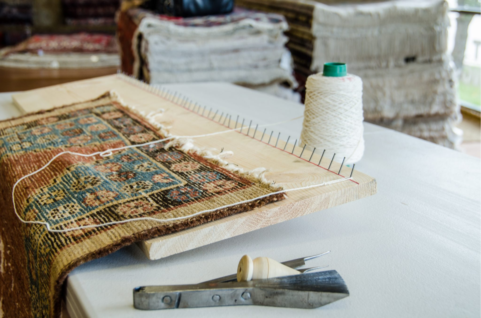Traditional rug weaving tools representing our craftsmanship heritage